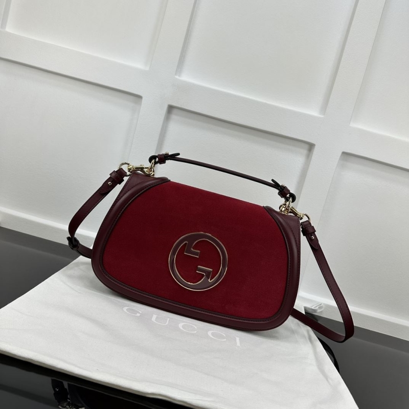 G*u*i top handle bags